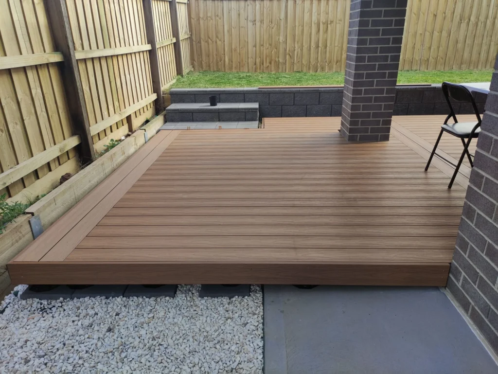 Composite decking tiles over concrete patio install