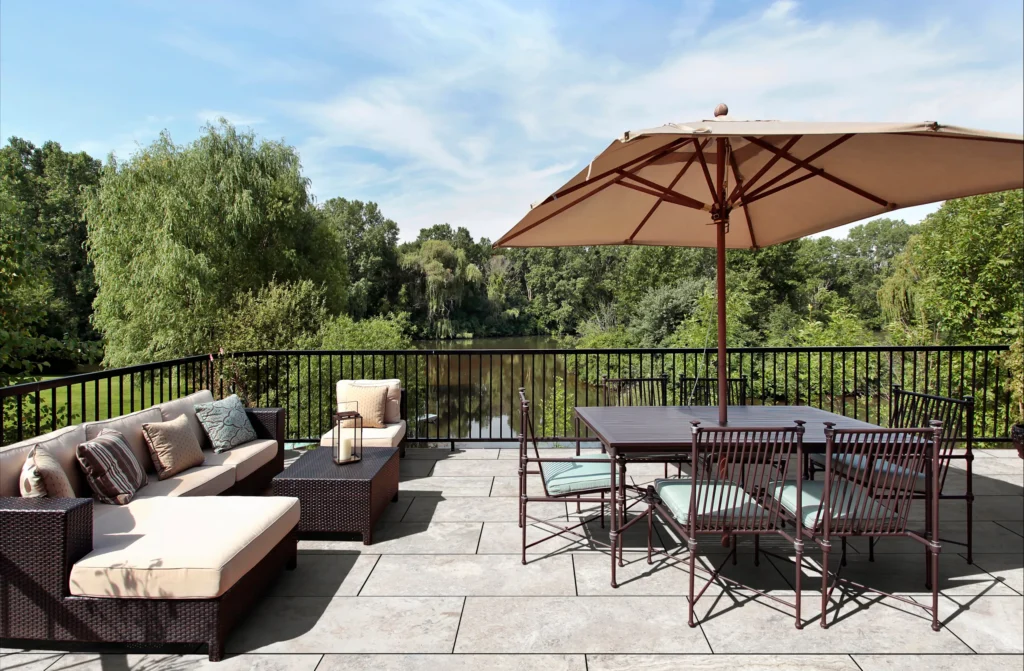 Outdoor patio flooring types porcelain pavers natural stone composite decking gravel 2025