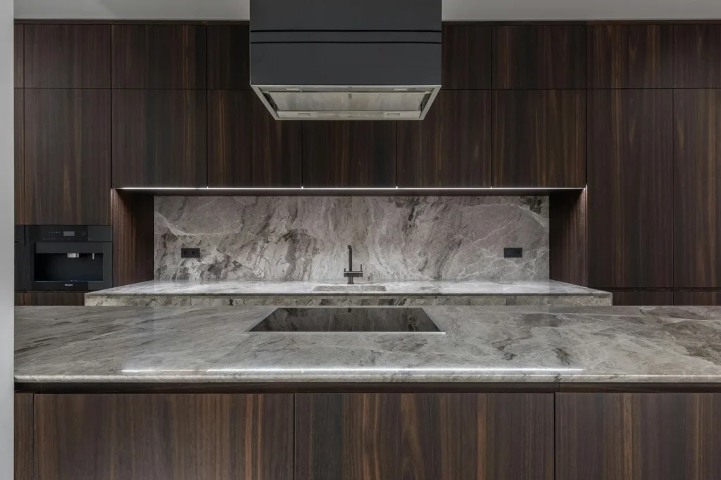 Granite colors trending 2025 cream taupe charcoal slabs