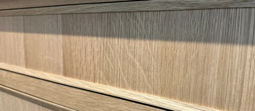 Rift white oak grain cabinet door close up