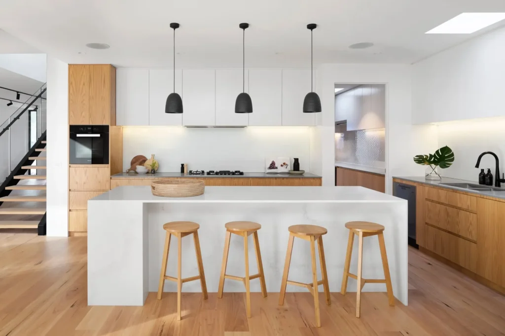 Warm white kitchen wood accents 2025