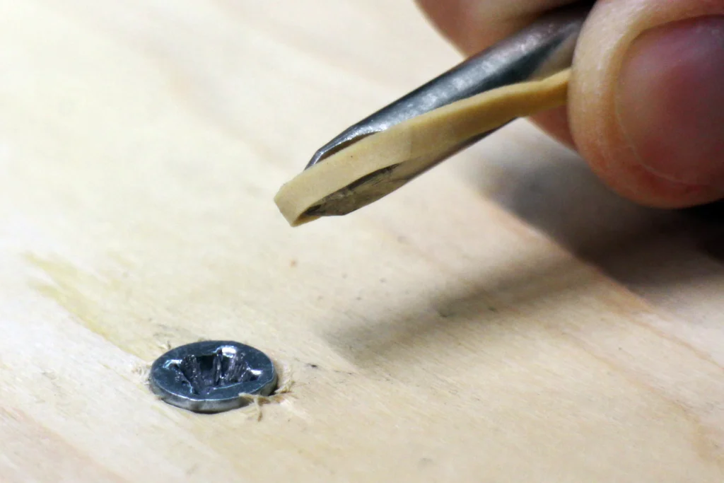 Rubber band trick stripped screw