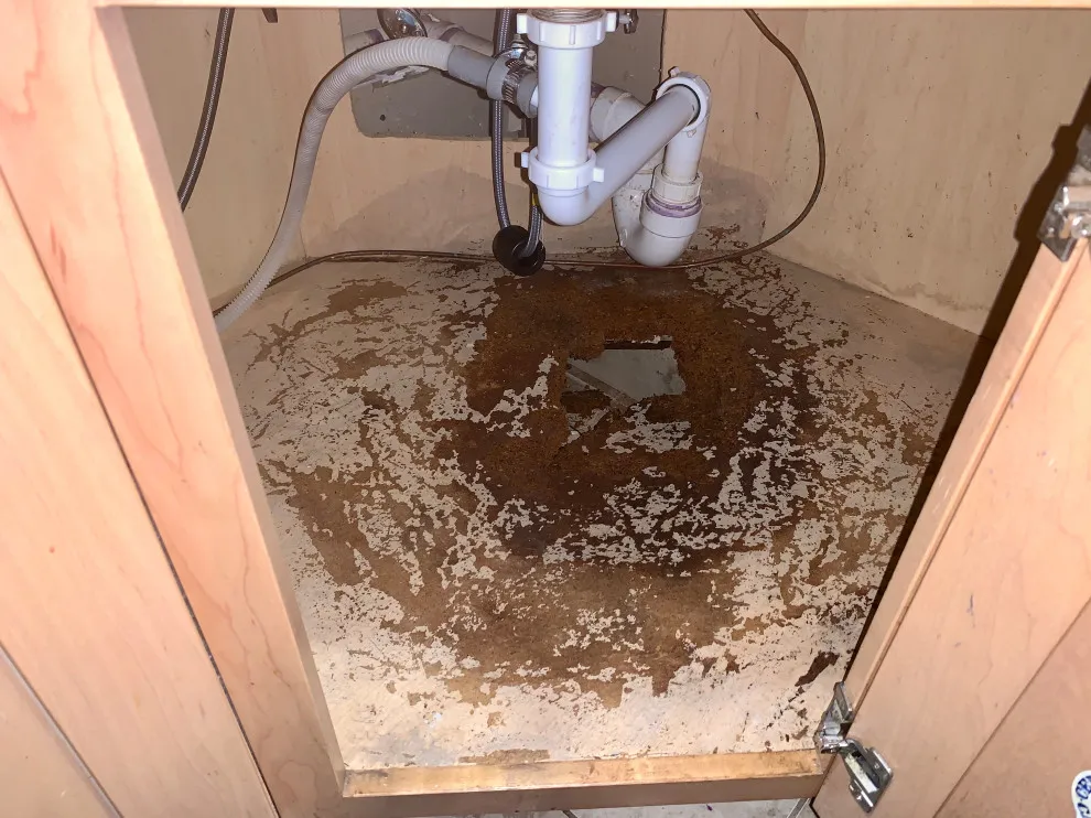 Water damaged kitchen cabinet base