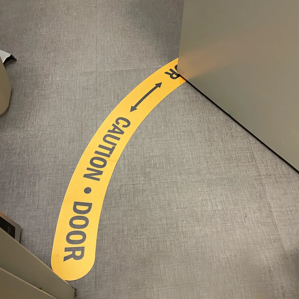 Door swing clearance arc tape floor conflict radiator stair appliance