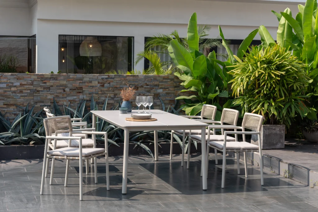 Outdoor terrace with coordinated lounge seating and dining set